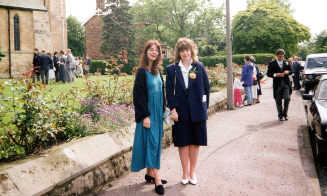 This is the only picture I can find of me wearing the dress (with my friend Paula, attending a wedding circa 1992)